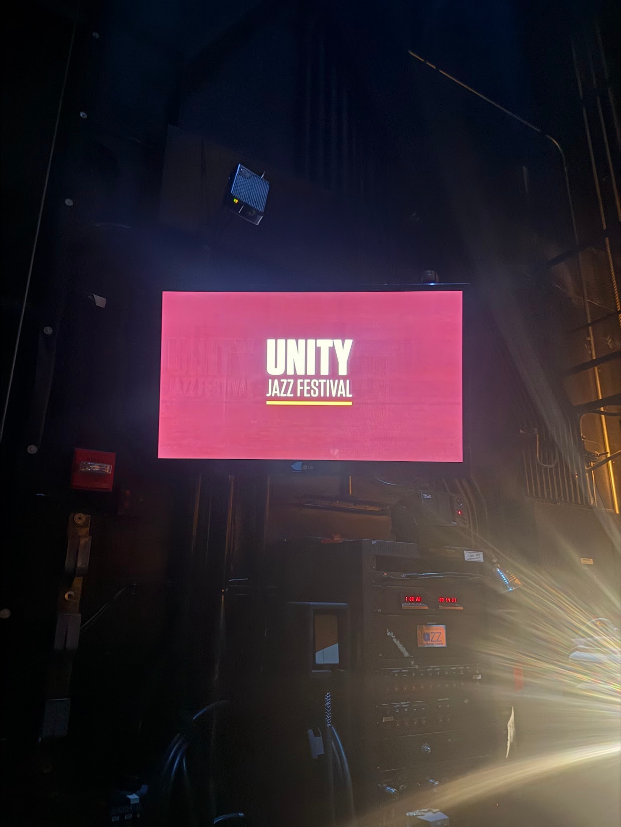 Unity Jazz Festival branding on LED screen at venue